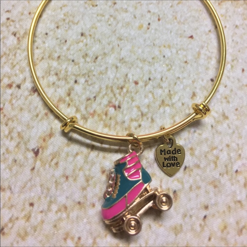 Gold plated roller skate bracelet